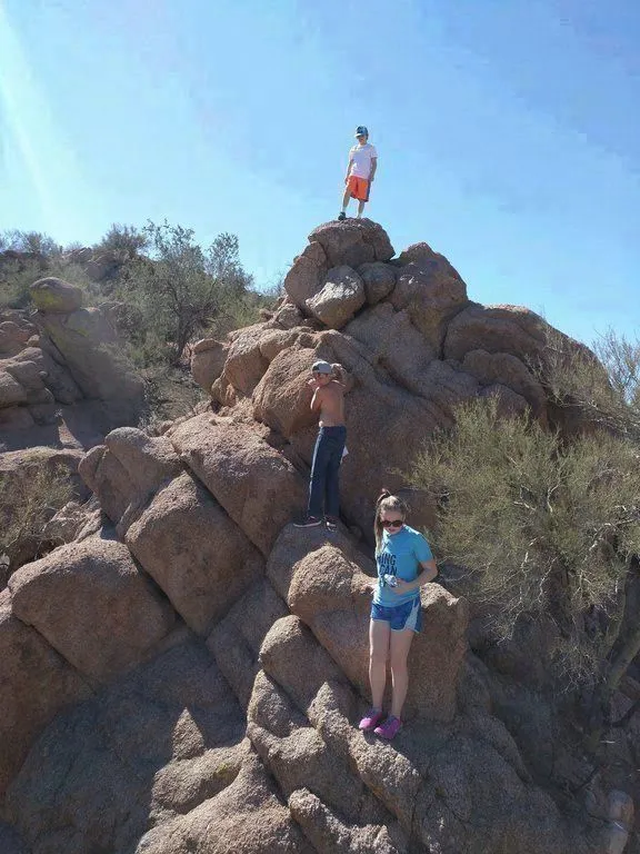 Kids climbing on the rocks